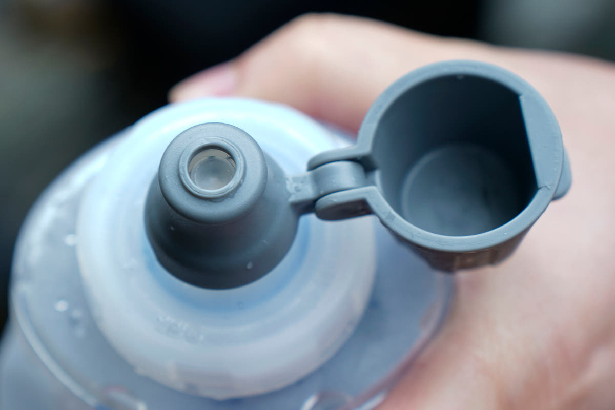 Close-up of the raised drinking spout and open dust cap